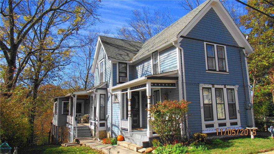 Historic Victorian in excellent condition and in an excellent location.  Two new gleaming white baths. Beautiful new kitchen with granite counter tops and bamboo flooring. Spacious living areas, hardwood floors, many windows, original pocket doors, stained glass and charming porches.   Other  amenities are a great deck overlooking private, treed back yard, gas log fireplace, new heat pump upstairs, new w/dryer in  area adjacent to upstairs bath.  Quiet street within walking distance to restaurants, shops and galleries.