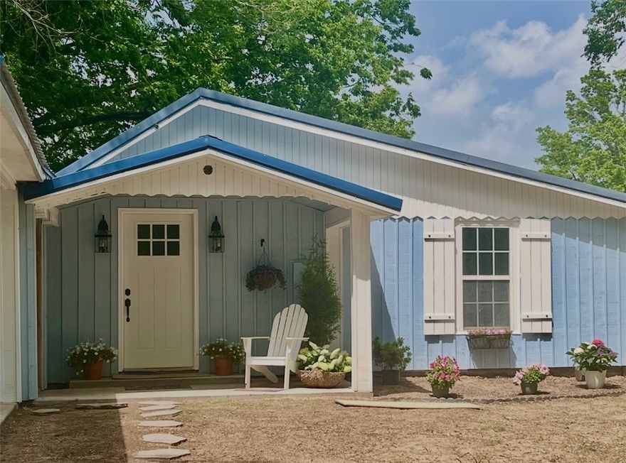 Charming, remodeled farmhouse featuring 3 bedrooms, 2 bathrooms, and approximately 1300 sq ft., nestled on approximately 1.3 beautiful acres with mature trees and room for a garden.  This property offers the perfect blend of modern updates and country charm with 2-car covered carport, detached 1-car garage/shop, new HVAC, large utility/mudroom with ample closet space, large storage/bonus room and a storm shelter for added peace of mind. Located in the center of town, near the park.  This property provides room to relax, work and enjoy the outdoors.  Property also offers additional development potential with city-approved ability to split additional lots, and electric boxes already in place for two additional homesites; Buyer to verify all lot split and development opportunities with the city.