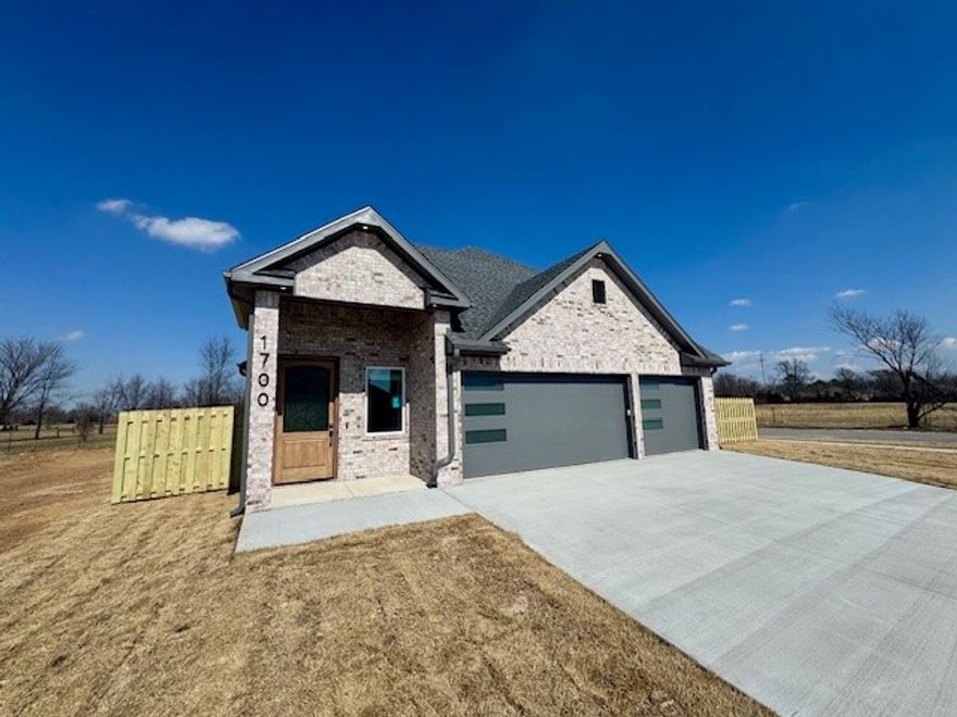 This stunning new construction 4-bedroom, 3-bathroom home offers the perfect blend of modern design, thoughtful upgrades, and an unbeatable location in a highly desirable neighborhood close to top-rated schools, shopping, dining, and commuter routes.  The home features a gourmet kitchen equipped with upgraded countertops, custom cabinetry, a center island with seating, designer tile backsplash, and premium appliances.  The spacious primary suite serves as a private retreat with a spa-inspired ensuite bath showcasing dual vanities, a walk-in shower, and a generous walk-in closet.  The exterior impresses with fresh landscaping, a covered patio ideal for entertaining, a privacy fenced yard and a three-car garage, making this move-in-ready home a rare opportunity in a prime location.