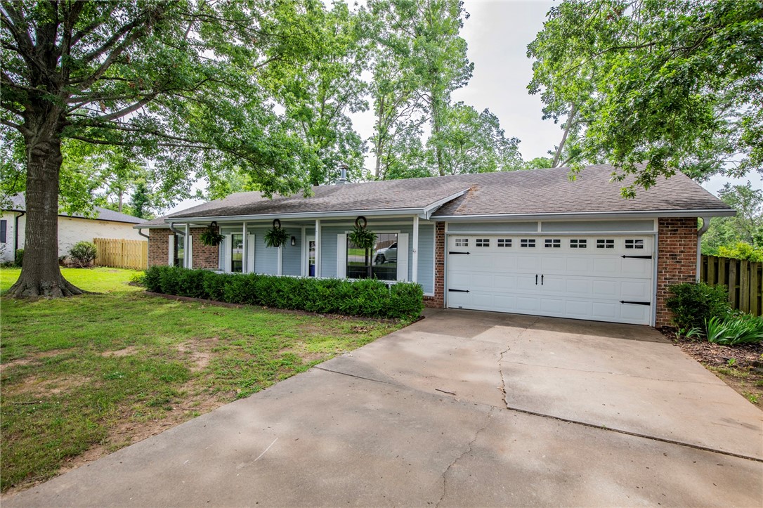 Exceptional Turtle Creek property is yours for the taking! Literally walk out to your backyard and hop on the Turtle Creek/Greenway bike trail. Inside you'll find a move in ready home with fresh carpet in the bedrooms and office/flex space. New paint inside and out! You'll love the open plan with all the charm of and 80's build with a real wood burning fireplace. The location on this one is unmatched. It's in the heart of North Rogers, just minutes to everything in Rogers and Bentonville. Zoned for Grace Hill, Oakdale, and Rogers Heritage High.