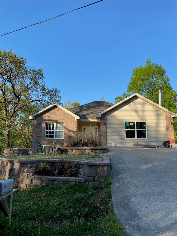 Cash Offers Only! Investor's Dream, Bring Your Cash! 1700 square foot house with new hardwood floors and new wood-burning fireplace. The rest of the house needs TLC. Includes next door lot with new garage built 2020. Lot next door is a separate parcel#. A new house can be built with a new garage and sold separately if the family room in the main house is converted back to a garage. Extra hardwood is available to finish the rest of the house and will convey with full price offer.