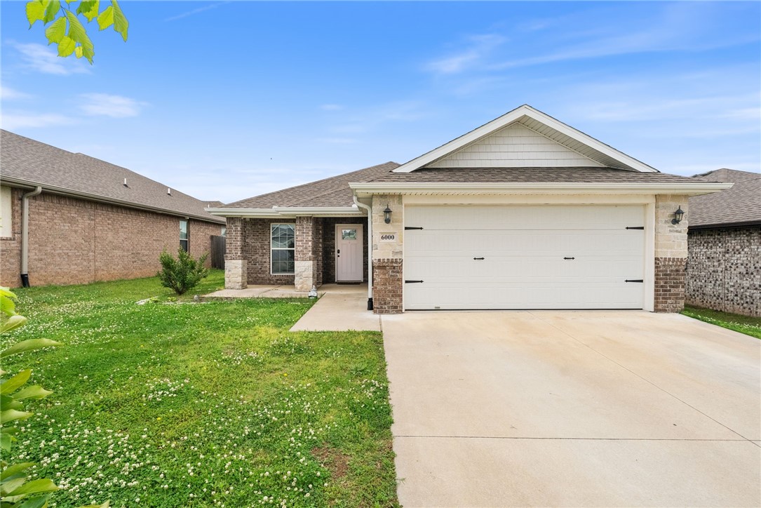 This beautifully maintained home is nestled in a desirable newer subdivision in Bentonville, AR. This inviting residence offers a thoughtfully designed open floor plan with abundant natural light & stylish upgrades throughout. The heart of the home features a spacious kitchen with granite countertops, a large island with seating for four, & upgraded bar pendant lighting. The primary suite comes complete with a custom subway tile shower, built-in bench, & upgraded faucet for a spa-like retreat. The entire home boasts LVP flooring. Enjoy outdoor living with a 4'x10' concrete front patio extension & a 7'x12' concrete addition to the back patio, ideal for relaxing or hosting gatherings. The fully fenced backyard provides privacy & includes a 120 sq ft storage shed that conveys with the property. Just minutes from Bentonvilleās top schools, shopping, & dining.