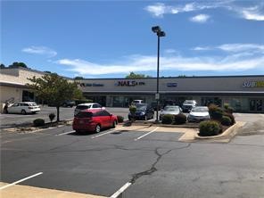 Last remaining space in a great mixed use center. 30,000+ cars a day! Lots of visibility and good traffic from current tenant mix. If you are looking to start or relocate a business- this is a great space!!