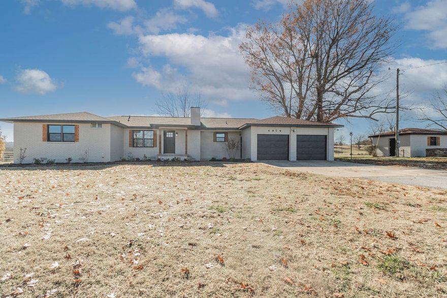 AMAZING PRICE REDUCTION!!! One and one half level acre setting for this stunning completely renovated home. Beautifully remodeled with modern touches throughout, including new interior and exterior doors, windows, fixtures, flooring, paint and much more! Open flexible living provides space for everyone. Fantastic kitchen is equipped with center island, tiled backsplash and marble countertops. Bonus room has potential to be an office, craft room, game room or family room. Beautiful warm stone fireplace. Countryside views and uncrowded relaxed feel with adjoining larger tract neighboring owners, yet conveniently only 5 minutes from Crossover Blvd. Detached storage building offers extra storage room or ideal for workshop. Room for additional outbuildings as well. Do not miss out on this opportunity!