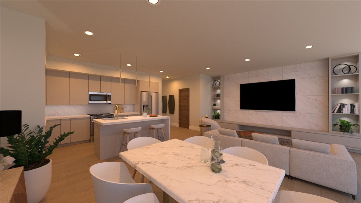 The townhomes at Parkside of Lowell showcase a modern aesthetic with thoughtfully designed open floor plans. Every unit features premium finishes, including quartz countertops, stainless steel appliances, and upscale luxury vinyl oak flooring. All-electric systems ensure energy-efficient heating and cooling for comfort and cost savings. Parkside combines contemporary design with an active lifestyle, with no restrictions on short-term rentals, making it a prime investment opportunity. Residents enjoy amenities like a clubhouse, gym, pool, and direct access to the Razorback Greenway for endless outdoor adventures. The community is centered around Kathleen Johnson Park, soon home to the NWA Space and Science Center, a soon to be major destination in NWA. The new flex space adds value with a mix of restaurants, businesses, and storage solutions for residents. As Lowell continues to grow in the NWA region, Parkside remains a standout community.