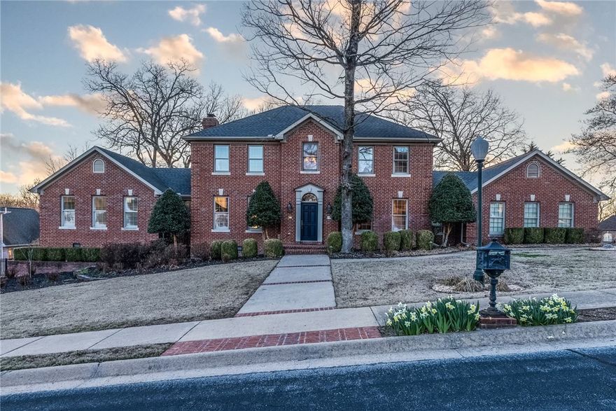 Stunning North Bentonville home. Perfectly situated on a 1/2 acre corner lot, amongst the tree-lined streets and immaculate homes of Hanover Subdivision. Established neighborhood connects to the Razorback Greenway trail system so you can be in Downtown Bentonville or Crystal Bridges Museum in mere minutes. The interior of the home has been elegantly upgraded and has 2 living spaces, both a bright family room and a pristine formal living room, 4 bedrooms, 3 1/2 baths and a bonus room. Cozy family room and chef's kitchen are open and several large windows let in plenty of natural light. Kitchen has high-end luxury appliances such as Bosch dishwasher w/water softener and Bosch double oven with side-opening doors. The star of the kitchen is the Thermador Star®Burner gas range. Primary suite has newly remodeled closet, plenty of space and a private door to the deck. Elegance, style, quality and function, this home truly has it all.