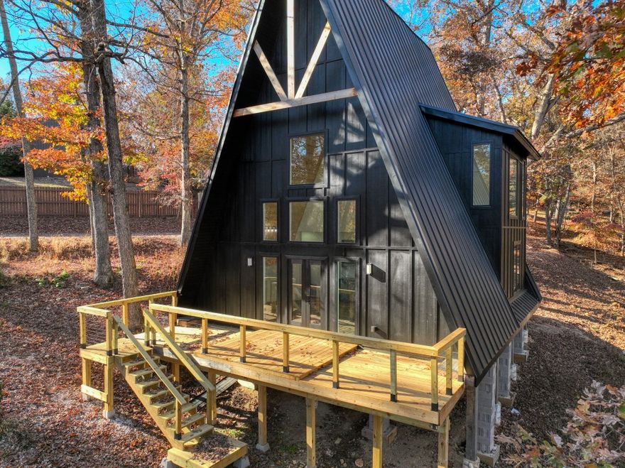 Here it is! The BRAND-NEW Beaver Lake home that you’ve always wanted but haven’t had the time to build! This cozy A-frame is perfect to bring family and friends for a lake weekend or move here full-time! Completed in 2025, this home has not been lived in, but is ready for your furniture! Lots of large windows give this home the feel of being up in the trees. The kitchen is completely open to the large living room for a social atmosphere. Its perfect location is close to Beaver Dam, Starkey Marina, the White River, and Eureka Springs. Use all the amenities and visit all of the events that Eureka has to offer but come home to the peaceful quietness of the lake area!