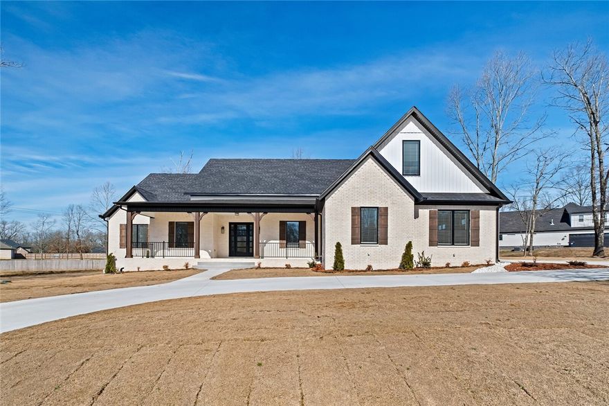 This custom-built home boasts 3,844 square feet with 4 bedrooms, 4 en-suite bathrooms and oversized 3 car garage. Situated on an estate sized 1+ acre, this home provides a warm & inviting atmosphere with soaring ceilings & abundant natural light. This open floorplan home features a gourmet kitchen with high-end stainless-steel appliances, 5 burner gas range with pot filler, custom floor to ceiling cabinetry, large island, & incredible hidden pantry with abundant space & cabinetry. Retreat to the first-floor primary suite with fireplace & spa-like bathroom with freestanding bathtub, dual vanities & generously sized. The walk-in closet offers ample storage & bathroom connects to the laundry room with built-in dog wash. Downstairs features 2 additional bedrooms/bathrooms, private office space and half bathroom. Upstairs, enjoy the 4th bedroom/bonus room with full bathroom & mini-kitchenette space. The backyard is perfect for outdoor entertaining with a large back porch open to large flat backyard with mature trees.