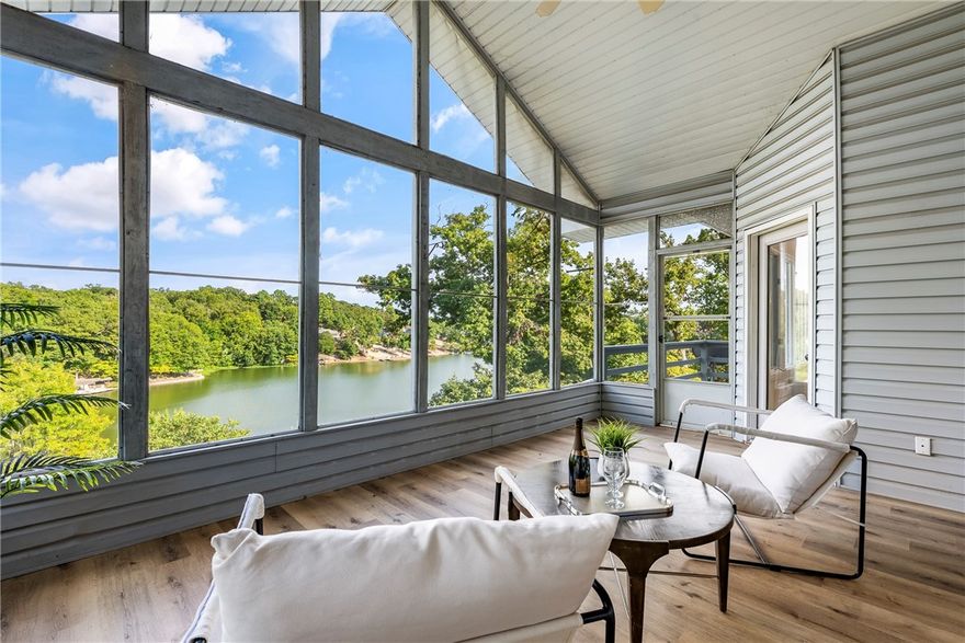 A perfect blend of luxury and natural beauty, this fully renovated lakefront retreat sits on the stunning shore of Loch Lomond. Two primary suites with walk-in closets make it ideal for multi-generational living or hosting guests. Upgrades include wood-plank LVP flooring, tile, a modern kitchen, new HVAC units, and water heater. Enjoy year-round views from the screened porch or private deck, then stroll the concrete path to the water for swimming, fishing, or kayaking. The kitchen overlooks the lake, complemented by a butler’s pantry and fully finished walkout basement. The oversized garage features a workspace for hobbies or gear. Mature zero-scape landscaping offers low maintenance. Residents enjoy a community dock, pool, and quick access to golf, trails, and other private lakes. This is more than a home—it’s a lifestyle on the water.