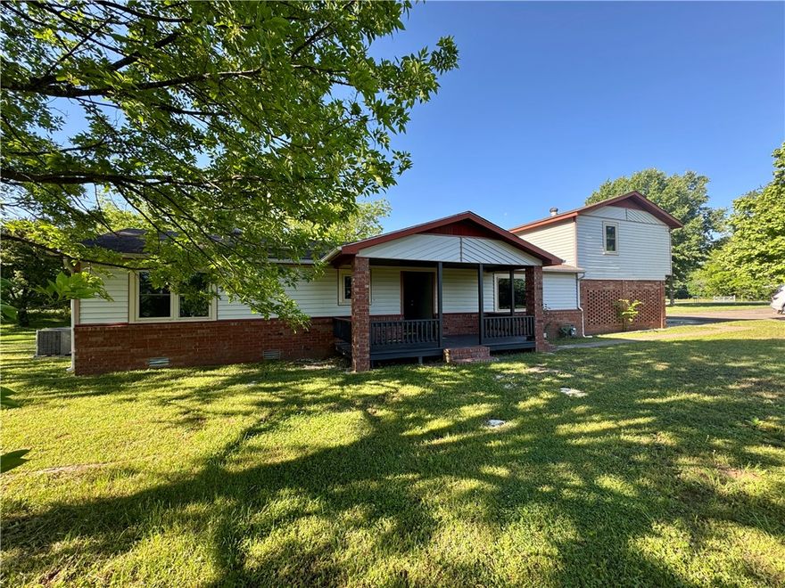 Warm, inviting, and beautifully updated for today’s lifestyle, this property offers over 1,800 square feet of comfortable living space with 4 spacious bedrooms and 3 full baths, all set on 1.12 acres in Russellville. Designed with flexibility in mind, it features two private ensuites—one on the main level and another upstairs—ideal for multi-generational living or added guest privacy. The main level showcases an updated kitchen with sleek new cabinetry, granite countertops, and stylish appliances, opening to a spacious living area, along with three bedrooms, two full baths and a generous laundry room. Upstairs, you’ll find a private retreat complete with an ensuite, walk-in closets, and a versatile bonus space perfect for a home office, hobbies, or additional living area. With modern updates throughout and plenty of room to enjoy both indoors and out, this home offers the perfect blend of comfort, style, space and convenience just minutes from everything Russellville has to offer.