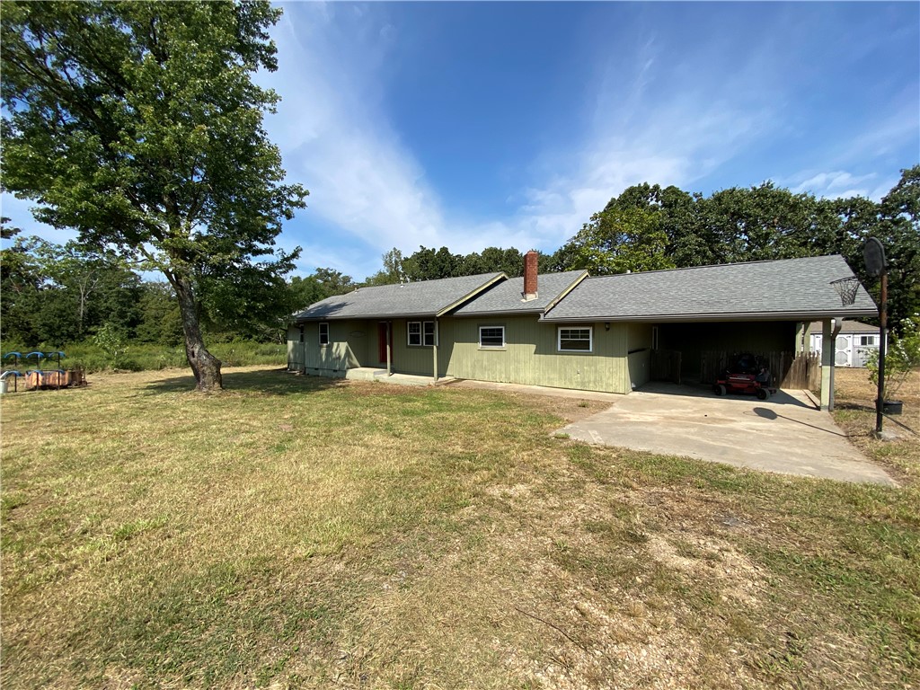 Located just 15 minutes from the Bentonville Square, this property blends privacy and charm with convenience. At the heart of the property is a 3-bedroom, 2-bathroom home featuring a mud room, spacious den, and a walk-in pantry. The interior has been newly renovated with new flooring, painting, and complete makeover of the hallway bathroom.
The property features a small pond behind the home, a wet-weather creek, two outbuildings perfect for hobbies, and a barn. With plenty of fencing, this property is ideal for animals and has a perfect blend of cleared and wooded land for outdoor enthusiasts. All this tranquility is just 15 minutes from the Bentonville Square, 17 minutes to Crystal Bridges, 8 minutes from Bentonville West High School, and 5 minutes to I-49.