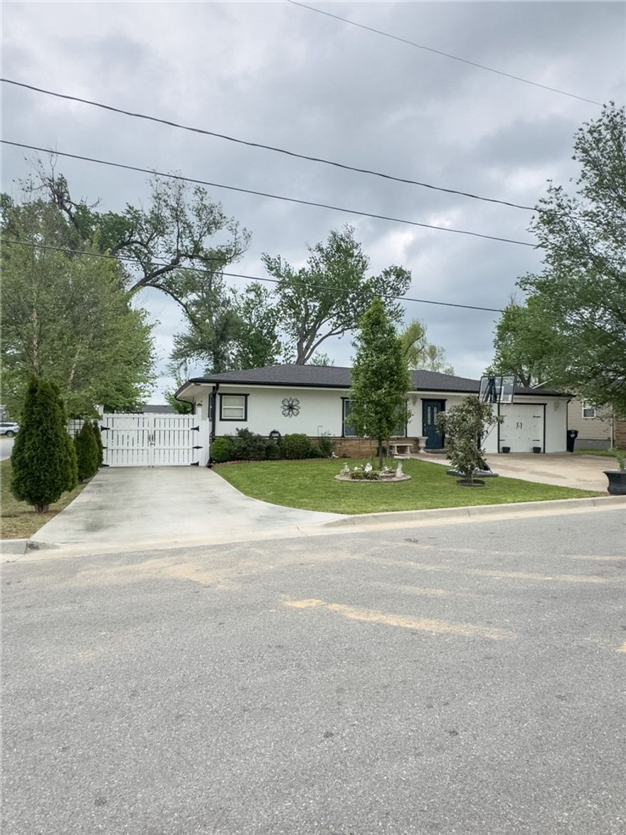 Welcome to this gorgeous and well maintained 4-bedroom home offering space, flexibility, and an incredible backyard setup—just minutes from downtown Rogers. Inside, you’ll find an expansive living room that opens into a generous eat-in and dining area, creating the perfect space for hosting and daily living. The bedrooms are spacious with multiple large closets throughout—ideal for growing families or anyone needing extra storage. 
The garage features an air vent and insulated garage door, giving you the option to easily convert it into a bonus room, home gym, or additional living space.
The backyard is a true highlight—massive, private, and ready to enjoy. Whether it’s kids playing, hosting cookouts, or even practicing soccer, this space delivers. Plus, with two separate drive-in entrances, there’s room for trailers, extra vehicles, and more.
With this unbeatable space, versatile layout and prime location, this one is a must-see.