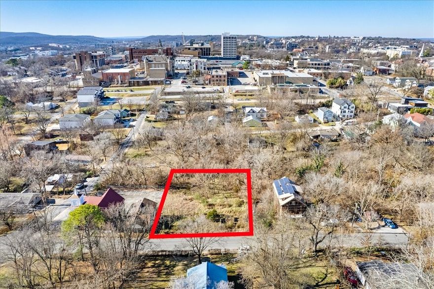 Rare, by-right development opportunity just down the hill from the Old Courthouse and only a few blocks from the Fayetteville Square. This combined offering includes three contiguous lots totaling approximately 0.4 acres, allowing for straightforward, low-friction infill development in a prime downtown location.

The property lines can easily be reconfigured, making it possible to create three differently shaped lots to fit a variety of residential layouts. A creek along the west side of the property adds natural character and provides a built-in buffer rarely found this close to downtown.

Well-suited for two to three single-family homes or a small residential infill project, with development options that align with existing zoning and surrounding context. Ideal for builders or buyers looking for a simple, by-right path to new construction near downtown amenities.

Offered as a package. Buyer to verify zoning, lot configurations, and development standards.