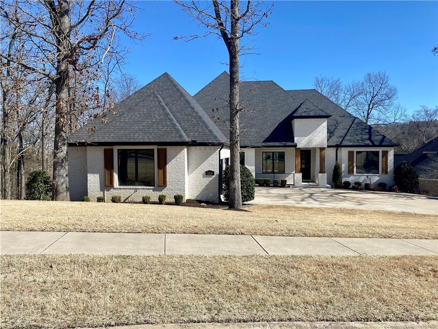 Gorgeous like-new construction in desirable East Fayetteville subdivision. This spacious home has amazing floorpan with master and 3 bedrooms on main level and 5th bedroom PLUS bonus area upstairs complete with a full bathroom. Walk in to a large open concept main level with cozy wood beams and built-ins in the living room. The kitchen is a chef's dream with massive island, gas cooktop, and double oven and oversize commercial refrigerator. Hang out in the backyard oasis with professional landscaping surrounding the pool and spa. Unfinished basement with approx. 1,600 sq feet has been poured with a concrete slab to make the gym or home office of your dreams! Whole home been freshly painted as well as the cabinets. Root school district.