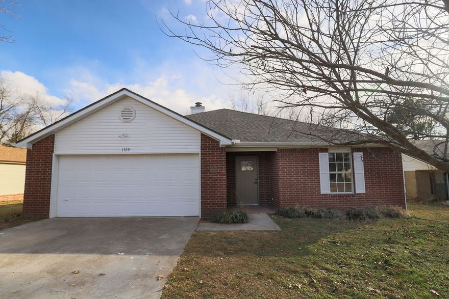 Fully remodeled and move-in ready, this 3-bedroom, 2-bathroom home offers the perfect blend of modern updates and unbeatable convenience in the heart of Springdale. Step inside to find luxury vinyl plank and ceramic tile flooring throughout, a kitchen featuring granite counters, a pantry, and updated appliances. The living room showcases a cozy gas log fireplace, while thoughtful touches like ceiling fans, a programmable thermostat, and walk-in closets add everyday comfort. Enjoy peace of mind with a newer roof and HVAC system approximately five years old. The covered patio overlooks a privacy-fenced backyard, and a storage building provides extra space. A 13Kw Generac gas-powered generator conveys fully connected to the home with a dedicated breaker box for seamless backup power. Located directly across from Tyson headquarters with quick access to Lake Fayetteville and the Razorback Greenway Trail, this home delivers an exceptional lifestyle. Schedule your showing today!