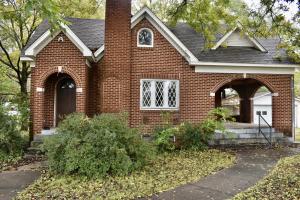This beautiful home is the epitome of charming. With unique crown moldings, custom windows and doors, and original hardwood floors, this property would be an amazing office or home with some updating and creativity. Centrally located, you don't want to miss this gorgeous home