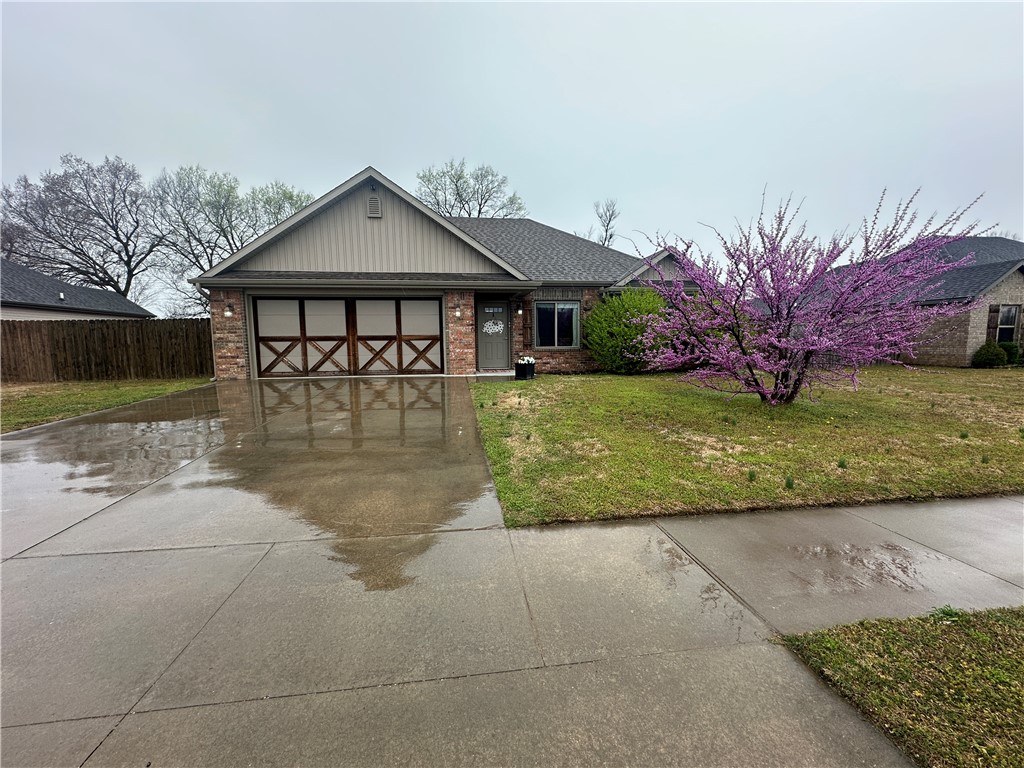 Located in a cute and clean neighborhood, this home features a split floor plan, eat-in kitchen, and plenty of pantry space. Enjoy no carpet with wood laminate flooring throughout, a gas log fireplace, covered back patio, an extraĀ large flat backyard with privacy fence and gutters on the front and back. Walk to school and enjoy the easy life! Schedule your showingĀ today!