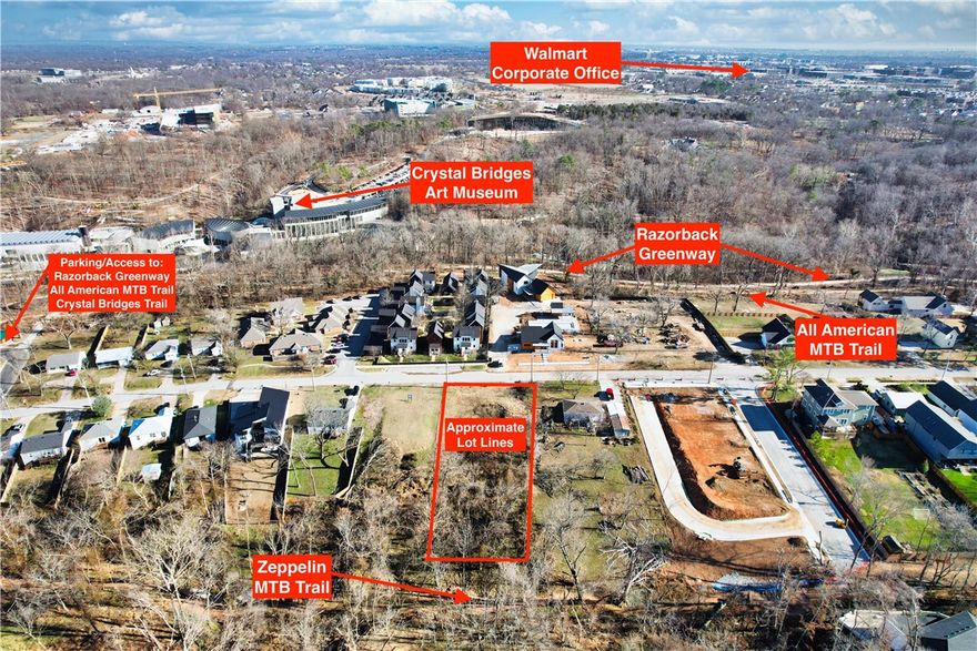 The only large lot on the market to build your custom dream home in this stellar location literally steps away from the All-American and Zeppelin mountain biking trails, Crystal Bridges and the Downtown Square. DN-2 zoning this level lot offers public/shared alley access, granting you the flexibility to design a home or homes tailored to your vision and lifestyle. Enjoy the convenience of living within walking distance or a short bike ride to Bentonville's amazing restaurants, coffee shops, the City's new Quilt of Parks and expansive paved single-track trail system. Don't miss this rare opportunity to create your dream home in the heart of Bentonville. The lot has a current survey. The lot extends to the Zeppelin trail to the west. Owner is a MO licensed real estate broker