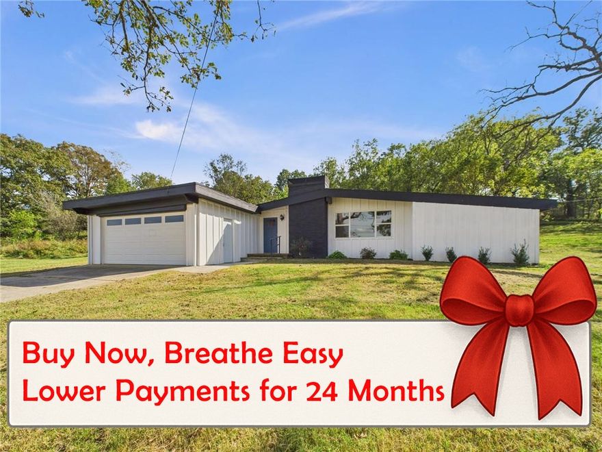 Attention Buyers!!  Get a lower mortgage payment. **
Enjoy the best of both worlds—modern comfort and peaceful country living—at 14257 Osage Creek Road in Springdale, AR! This renovated mid-century modern home sits on 2.63 acres just outside city limits near Tontitown. Updates include a new roof, new septic, new luxury vinyl plank flooring, and a fully updated kitchen with stainless-steel appliances and stylish finishes. The open layout flows into a bright four-seasons room, adding extra living space for entertaining or quiet mornings with a view. There’s plenty of room for a garden, chickens, or a horse or two, offering true rural living close to town. Enjoy move-in confidence with a seller-provided home warranty. If you’re seeking acreage, privacy, and a modern feel minutes from Springdale amenities, this home checks all the boxes! **2-1 buydown offered with sellers preferred lender! Get 2% off rate for year one (paid by Seller) & 1% off rate for year two (paid by lender) and back to the current rate on year 3.