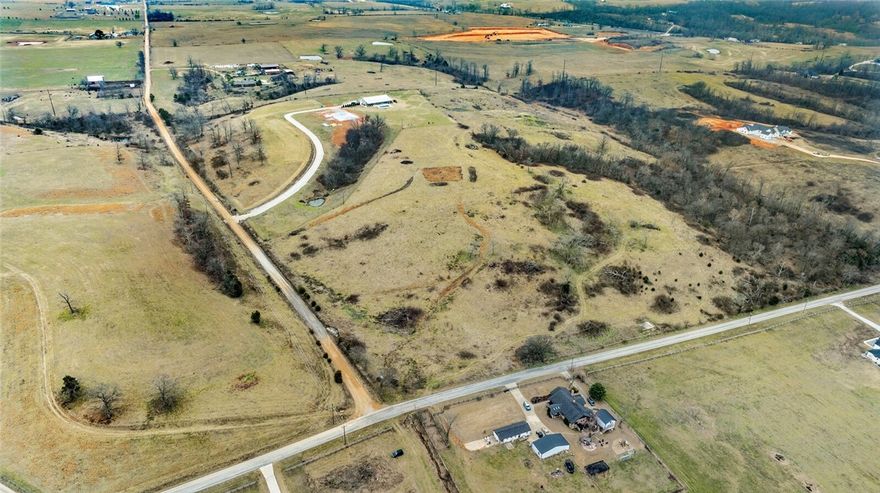 Experience the epitome of freedom and potential on this expansive 10.88 acre property in beautiful Bentonville. This pristine parcel of land offers a rare opportunity to build your custom home without the constraints of restrictive covenants, allowing your architectural vision to flourish freely. Located in one of Northwest Arkansas' most sought-after areas, this property perfectly balances peaceful country living with convenient urban access. The bustling Downtown Bentonville scene is just a quick 10-mile drive away, while the Northwest Arkansas National Airport is equally accessible at only 4 miles. The generous acreage provides endless possibilities for outdoor living spaces, gardens, or recreational areas. This exceptional lot presents a unique opportunity to create your legacy home while enjoying the perfect blend of privacy and accessibility. Don't miss the chance to bring your custom home dreams to life in one of Bentonville's most promising locations.