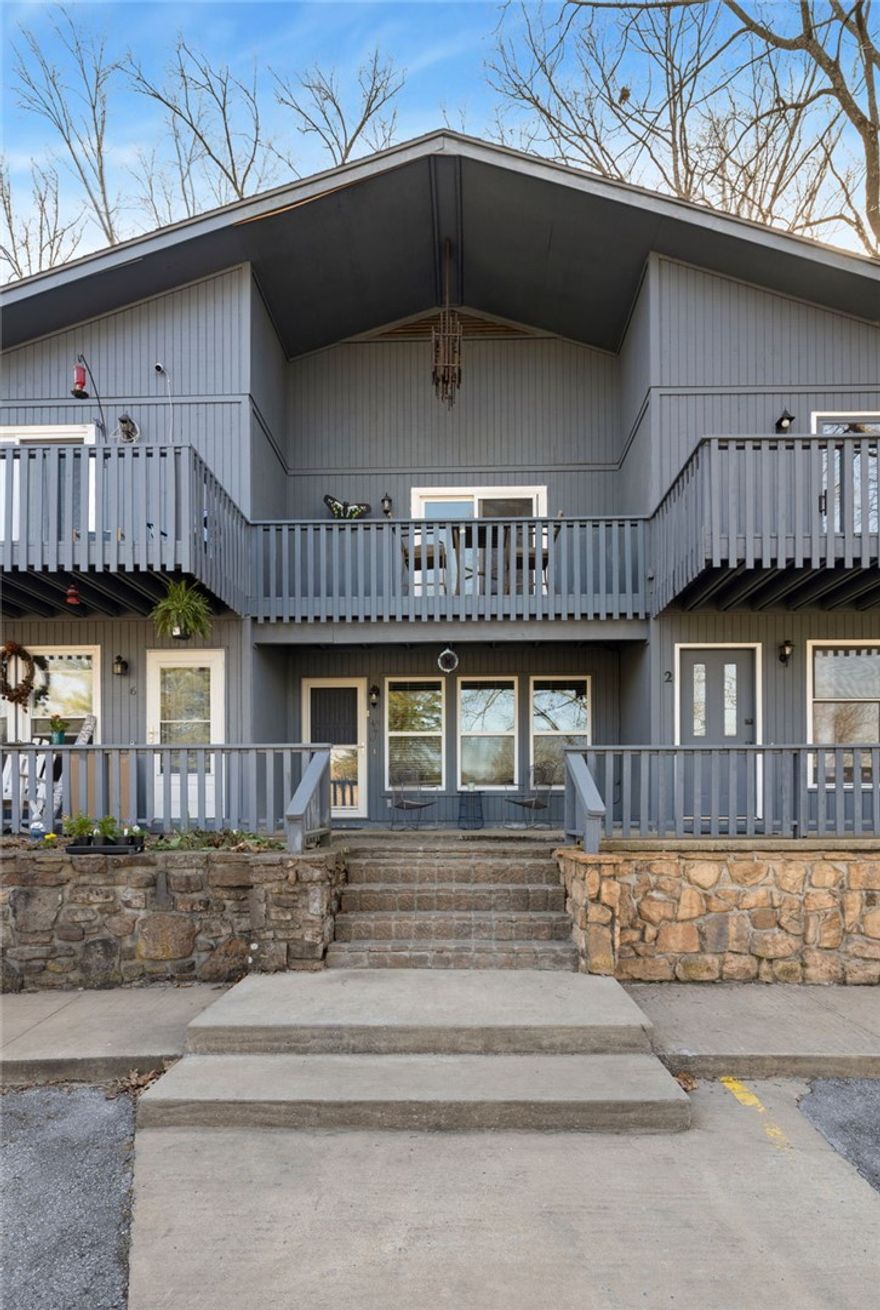 Ideally situated in a central Bella Vista location, this townhome offers a convenient, low-maintenance lifestyle—perfect for first-time buyers, investors, or those looking to enjoy all the community offers. With close proximity to the Bella Vista Country Club, trails, golf courses, and recreational amenities, this property provides easy access to everyday essentials and outdoor recreation. The main level features a comfortable living area, dining space, galley-style kitchen, and a half bathroom. Upstairs, you’ll find two bedrooms, a full bathroom, and a utility room. The primary bedroom includes sliding glass doors that open to a private balcony, creating a peaceful space to relax and enjoy the natural surroundings. With its functional layout, prime location, and access to Bella Vista’s renowned amenities, this townhome is an excellent opportunity to embrace a simplified, connected lifestyle.