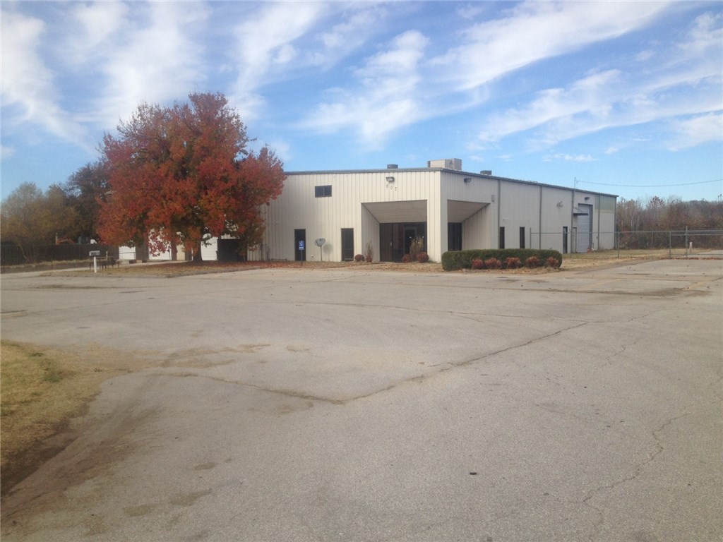 total of 6+ acres. Office/Warehouse occupies front 2 acre parcel with a separate parcel of 4+ acres adjacent on north side. Very acessable location. Call listing agent for floor plan of building. Building has 5,000 sq. ft. more or less of flexible office space, 6 restrooms and 9,000 sq. ft. of warehouse of which over 3,000 sq. ft. is climate controlled.