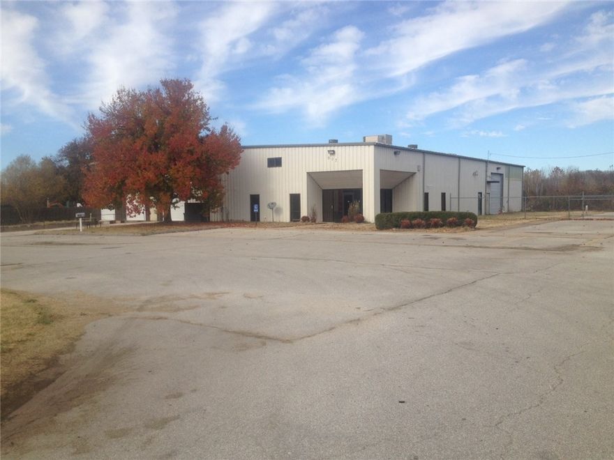 total of 6+ acres. Office/Warehouse occupies front 2 acre parcel with a separate parcel of 4+ acres adjacent on north side. Very acessable location. Call listing agent for floor plan of building. Building has 5,000 sq. ft. more or less of flexible office space, 6 restrooms and 9,000 sq. ft. of warehouse of which over 3,000 sq. ft. is climate controlled.