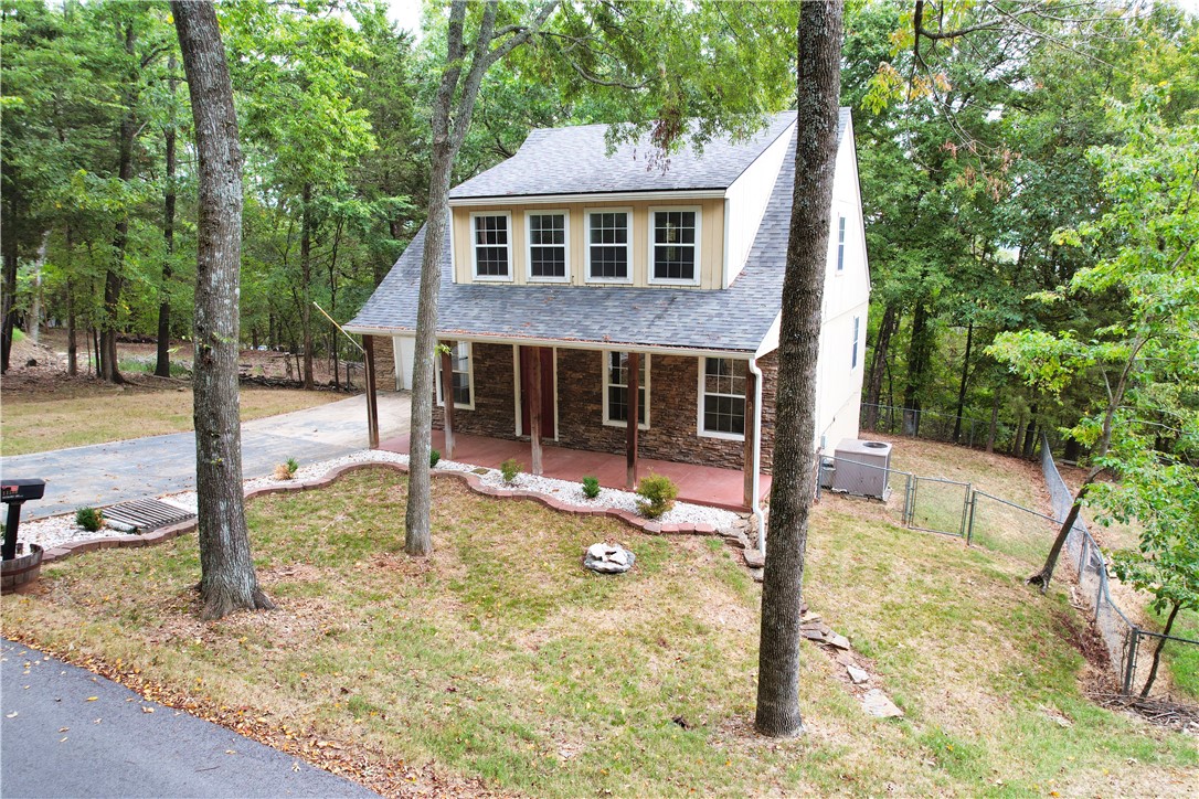 New price and incredible value now offered at $329,000! Take advantage of this expanded offering just in time for summer near Beaver Lake! Don't miss this opportunity for added value and space at an incredible price! This updated 4-bedroom, 2.5-bath home offers the perfect blend of comfort, privacy, and outdoor adventure, less than a mile from the public boat ramp.
Step inside to an open-concept layout where the updated kitchen flows into the family room, making entertaining a breeze. Enjoy brand-new luxury vinyl plank flooring, fresh interior paint, and a new roof installed in July 2024. Unwind on the oversized back deck while taking in seasonal views of Beaver Lake and the peaceful, wooded surroundings. With a gentle walk to the waterās edge, plus access to a community swimming pool, boat ramp, and recreation center, lake life has never been more convenient. Whether youāre seeking a full-time residence, vacation getaway, or investment opportunity, this property delivers location, lifestyle, and value!