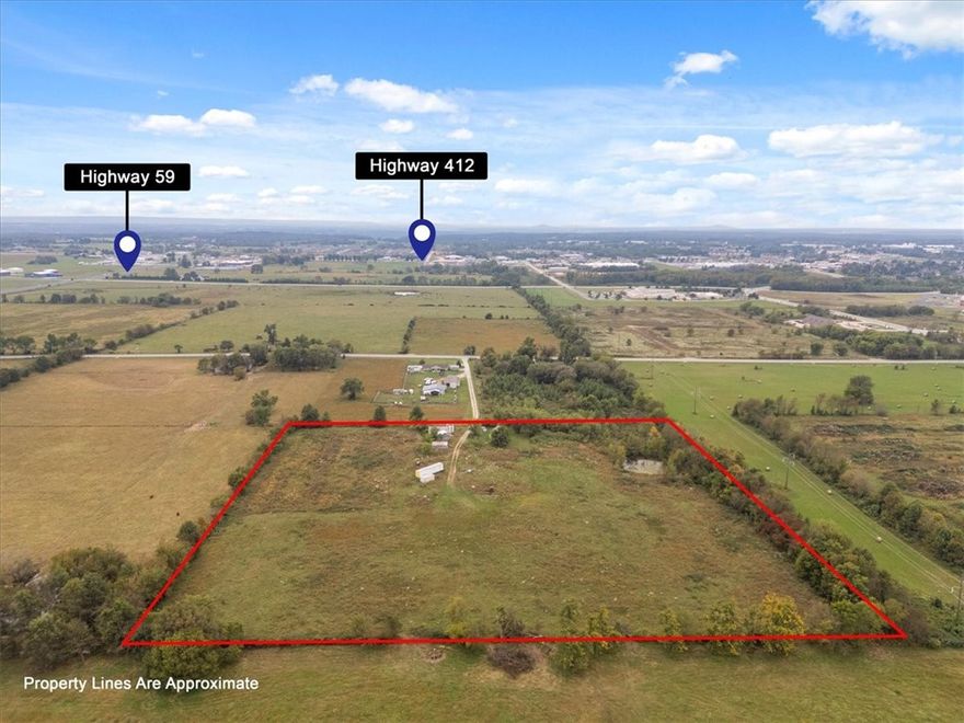 Prime 9.92-Acre Tract in Siloam Springs!
Discover endless potential with this versatile 9.92-acre property located just off Hwy 59, only minutes from the rapidly growing retail corridor along Hwy 412. The flat, cleared acreage includes a small home, shop building, and pondāperfect for a variety of uses. Ideal for single-family residential development, agricultural operations, or light industrial ventures. Property is accessed via a driveway easement and includes a well and septic system, with city water available at the street.