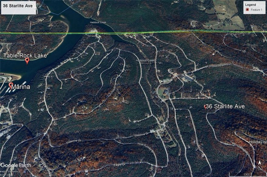 Ready to build your dream home? Near walking trails. Quiet and gently wooded, this spacious lot offers the best of both worlds. Enjoy the amenities in Holiday Island like golf courses, a country club, swimming, tennis and a marina with a fishing dock or watch the local fauna from your deck! Nearby Eureka Springs or Rogers offers great shopping and vibrant cultural hubs.