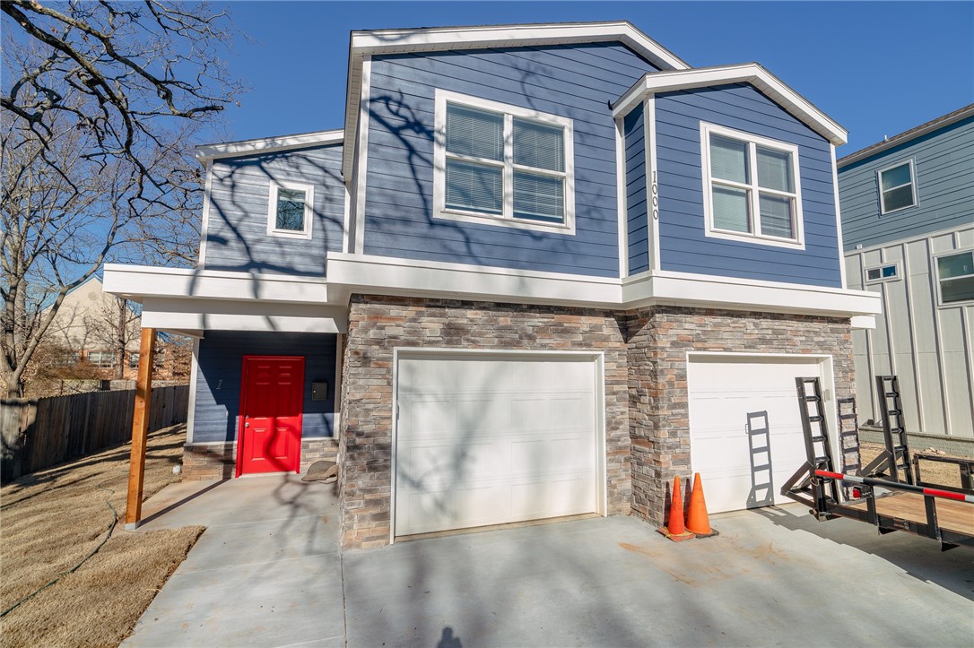 This nearly new duplex is situated near the university of Arkansas and is currently unoccupied on one side, perfect for an investor/occupant. The other side is occupied through 4/30/2026. Home features durable laminate flooring throughout, including upstairs. Kitchen has granite counters, dishwasher, stove, OTR microwave, and fridge w/ice maker included. Backyard has been fenced since photos, with each side having its own yard. A portion of the lot remains unfenced at the north end and is currently used as storage by owner.