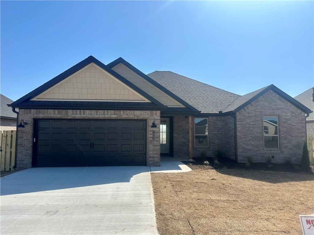 Pea Ridge welcomes you to its rapidly growing community. The Yorktown subdivision places you at the heart of it all, offering close proximity to schools, parks, and beautiful scenic views.This lot showcases the Sparrow Plan, where you're welcomed by LVP flooring and bright, airy touches that bring the home to life.The kitchen, living, and dining areas flow seamlessly together, with the kitchen offering ample storage, including a walk-in shelved pantry. Enjoy outdoor living with both covered front and back patios