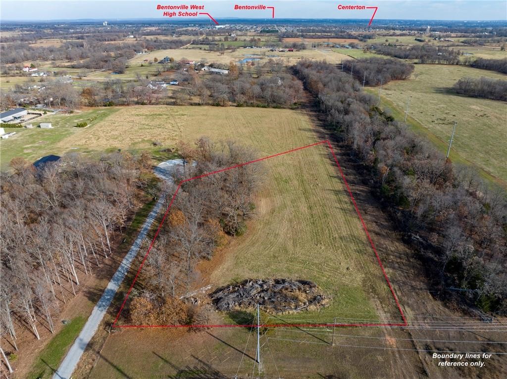 4.14-acre lot, ready for building your dream home! Mature trees line the back side & a section near the road for seclusion, yet the lot is open, and easy to begin construction quickly. This platted-out subdivision is close to I49 and Bentonville, Bella Vista, and Centerton areas-only 16 minutes to the Walmart Home Office, 9 minutes to Bentonville West High School, and 15 minutes to XNA. BentonvilleSchools! This property is truly centrally located to anywhere in Benton County. Covenants include no mobiles. Electric and Centerton Water are available at the street, septic is required. Perc test available. Starlink Internet is available, too!