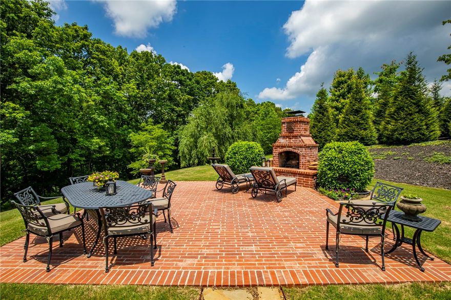 If you love peace, nature and the lake, this beautiful custom built 3,664 sqft, 4 bedroom, 2 full, 2 half bath well maintained home, may be for you! Perched on a hill on 4.33 acres, the home overlooks the Ozark Mtns and both sides of Coose Hollow Cove and is outfitted with a serene setting in exclusive lakefront gated subdivision only 15 mins to downtown Rogers and 5 mins to Prairie Creek Marina by boat! Fabulous split floor plan that flows with ease equipped with office, formal dining, walk in butler’s pantry, enormous mud/craft room, retreat in walk out basement and multiple outdoor spaces makes this home great for entertaining. Packed with a punch with amenities such as central vac, surround sound, security sys, lots of windows to bring the outdoors in, 11ft ceilings, extensive crown molding throughout, hardwood flrs, granite countertops, back up propane HVAC system, shop for the toys, oversized garage, motorized attic lift, boat slip, and room for pool, guest house or extra garage and everything is like new!