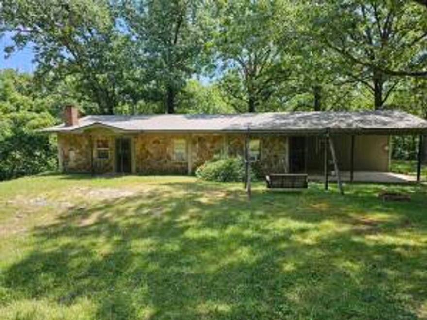 1 YEAR HOME WARRANTY INCLUDED!! OFFERING Discover the perfect blend of nature and comfort with this enchanting 4-bedroom, 2-bathroom home nestled near the Buffalo River, White River, and Greers Ferry Bay. Boasting an open concept design that seamlessly integrates the living, dining, and kitchen areas, this home has been a haven for a family of 6 and is now ready to create new memories with yours.Situated on over 4 acres of picturesque land, this property offers an expansive playground for kids to explore the wonders of nature on the mountain side. The captivating surroundings of the Ozark Mountains set the stage for endless adventures and outdoor activities.