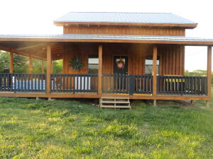 Almost new 2 bed 1.5 bath cabin with 2 acres near Buffalo National River outside of St. Joe, AR. The cabin, built in 2021, has nice views, great neighbors, is partially furnished, & move-in ready. The cabin has 2 bedrooms upstairs, central heating & cooling and will come with frig, elec cook stove, washer, dryer, couch, love seat, kitchen table with 4 chairs and 1 TV. Only 2.2 miles to Buffalo River & 3.5 miles to Woolum Campground and launch site. This would make an excellent Air B&B or VRBO income property because of the proximity to Buffalo National Park. If you choose to make this your permanent home, you already have some established pasture grass for a cow, horse or chickens & could have your own little mini-farm. This area is close to BNR & is highly sought after, don't delay.