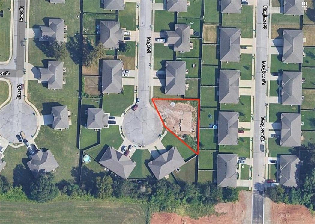 Great lot in a desirable location. A house has been started on the lot with footings, blocks, backfill and plumbing roughed in ($15,000 in improvements). House plan and site plan are attached. This is a duplex lot, the existing foundation can be removed to make way for a duplex. Also see MLS#1159874 for a lot in the same subdivision.