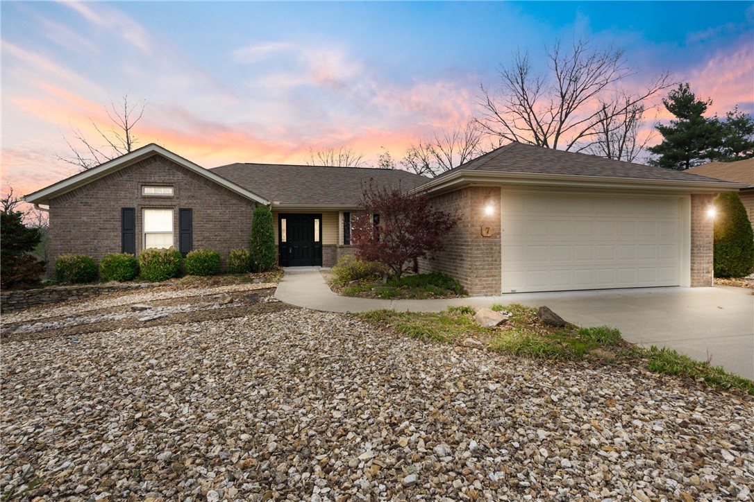New Fridge, microwave and washer/dryer included! $40k of maintenance free landscaping included! Don't miss out on this 3 Bed 2 Bath immaculately maintained split floor plan on a flat lot. The 4 seasons sunroom has 10 windows to sit and relax! Don't forget your 8x10 deck off the eating area and your fire pit in the back yard! Log Cabin hand scraped wood floors, carpet and tile flooring, gas fireplace in the living room. 8x12 storage shed conveys. Beautiful kitchen w/ granite, pantry and a spacious laundry room. Enjoy everything Bella Vista has to offer- 7 lakes, 7 golf courses, walking/biking trails, fitness centers, tennis, swimming, playgrounds, dining and country clubs and so much more!!! Located right by the Lake Loch Lomond and the Scottsdale Golf course for ease of access to both amenities! Convenient to Bentonville and I-49 and new Bella Vista bypass. New roof installed 2 years ago. .27 acre lot across street from home is available for purchase at an additional cost.