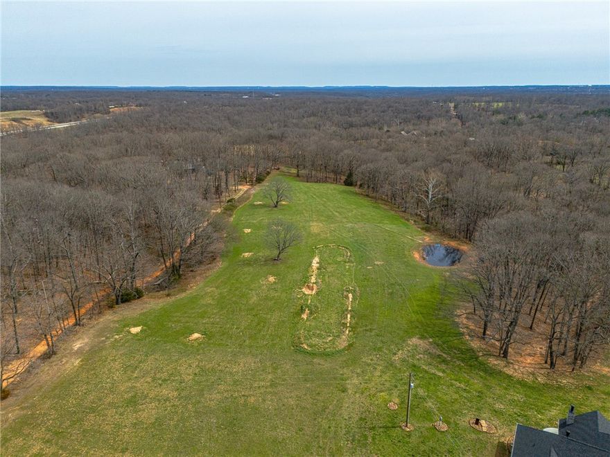 8.47 Acres of prime high land with strong development potential in Bentonville, Arkansas!

This elevated parcel is ideally suited for building a custom dream home or multiple residences.

Prime Location Features: • Directly next to Walmart on Highway 72 • Only 2 miles from I-49 • Excellent access and visibility

Parcel Number: 18-09659-003

Perfect for builders, investors, or families ready to create something special in Northwest Arkansas’ booming real estate market. Don’t miss this outstanding opportunity!
Cleared! Flat,  water electric septic available,Bentonville schools county property partially fence on three sides