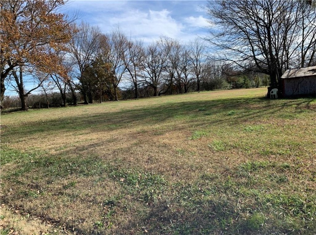 Great flat building site with water, electric & gas at street, will need septic. Possibility of getting rezoned to commercial.