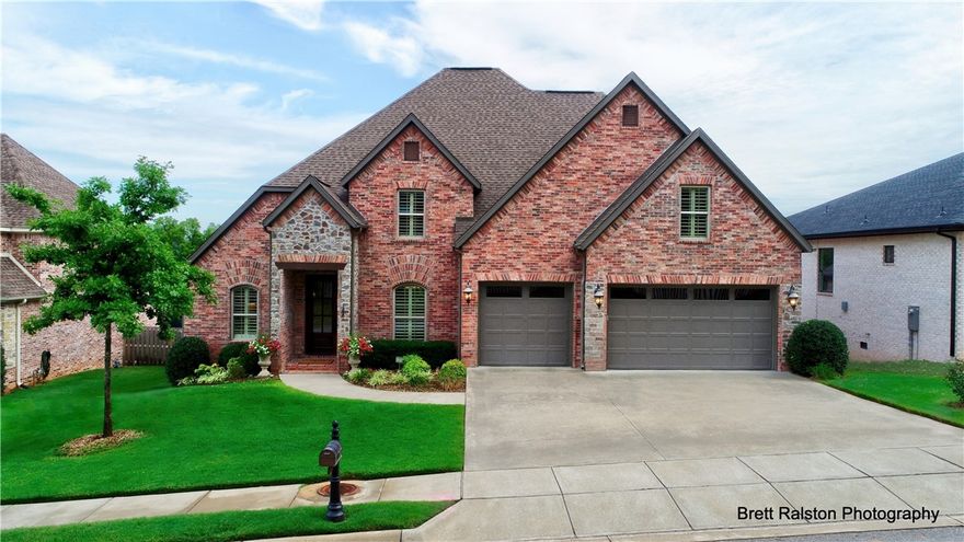 Amazing Horton Built Home, customized by seller,  architect, to increase the natural lighting and maximize a comfortable flow to the home. Customized home has natural granite throughout, LED lighting, entertaining room with large center island cozy fireplace inside and another on the back porch off of the eat in-kitchen.  Microwave also serves as convection oven. Home listed with 4 bedrooms but game room with wet bar has walk-in closet, easily could be a bedroom.  Upstairs has two Jack-n-Jill bathrooms, walkout attic storage, a bedroom modified to a craft room with professional ironing board and cabinets. Placed in sought after Shadow Valley, in a nice out of the way loop that will soon have members only entrance/exit right at the end of the street.