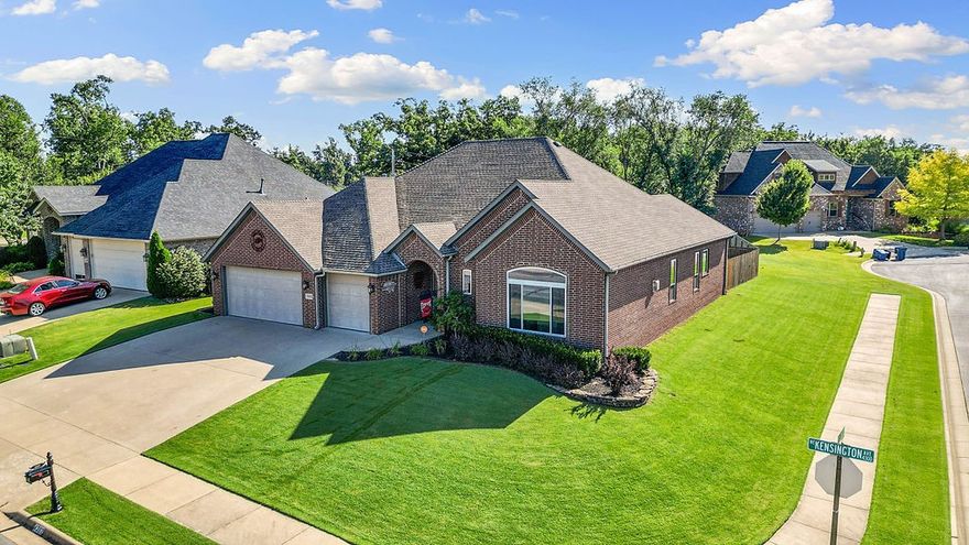 Impeccably maintained, one-owner, all-brick home in Kensington Subdivision—located just 2.5 miles from the Home Office. This spacious 1-level home features 4 bedrooms, 2.5 bathrooms & a rare 3-car garage. Inside is a large living room centered around a beautiful gas fireplace—perfect for relaxing or entertaining. The dedicated formal dining room offers plenty of space for gatherings, while the eat-in kitchen has SS appliances, ample cabinet storage & casual dining space. Enjoy seamless indoor-outdoor living with 3 separate access points to the back patio from the kitchen, dining room & primary suite. Primary bedroom features an ensuite bath with dual vanity, fully tiled walk-in shower & 2 spacious walk-in closets. Layouts include a split floor plan for privacy with 3 bedrooms on other side of the house. Home is smoke-free, pet-free. Many updates include roof, hot water heater, HVAC, windows & more. Don't miss this prime location with quick access to trails, schools, dining & Bentonville’s growing amenities.