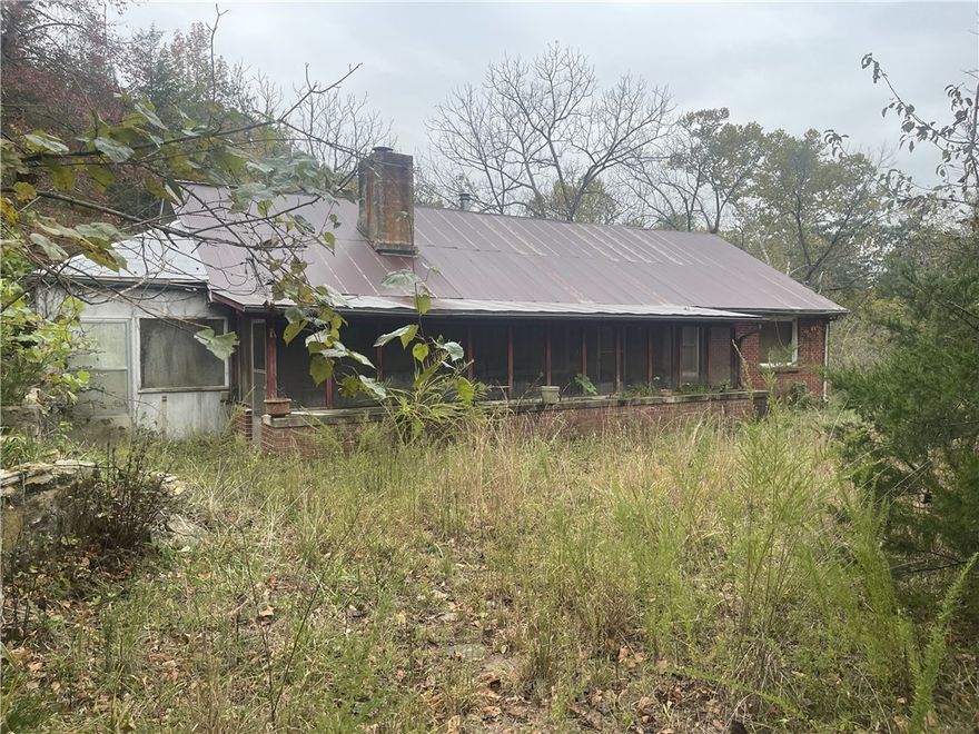 Tucked away in the Ozark foothills, this 38.33-acre m/l property is a haven for outdoor enthusiasts. The existing home needs work but could be transformed into a cozy hunting cabin or weekend getaway. Towering hardwoods, abundant wildlife, and a large barn make this an ideal basecamp for deer season or ATV adventures. Whether you're looking for a private retreat or a place to unplug and explore, this land delivers the ultimate backwoods experience.