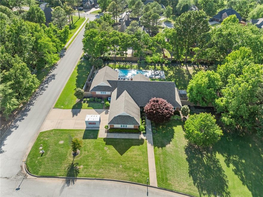 Welcome to your dream home located in one of West Rogers most desirable neighborhoods, Overland Subdivision just a hop skip and a jump away from I49 and NWA's famous bike trails. It doesn't get more convenient than this! This home sits on 0.63 acre lot, has saltwater heated pool, gorgeous professional landscaping and is an entertainers dream. This home has been tastefully updated throughout and offers 4 bedrooms, 2.5 baths, plus a Den and a bar looking out over the pool.  Fully fenced and new composite decking run the entire span of the home in the back yard. This one will go fast so act now.  PRIME LOCATION!