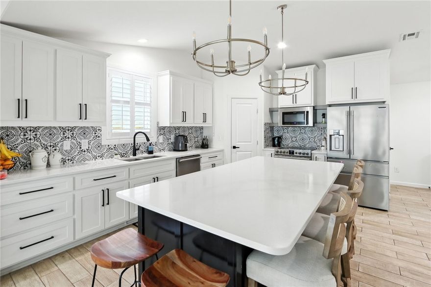 Meticulously renovated, offering refined living just 2.5 miles from the new Walmart Home Office campus, making it a fantastic choice for professionals. This elegant 3bedroom, 2bath home showcases an open-concept design with a spacious, light-filled kitchen, seamless dining and living areas, & sophisticated finishes throughout. Thoughtfully updated inside and out, every detail reflects quality and intention. Enjoy a private, fully fenced backyard with a spacious porch—ideal for morning coffee or evening gatherings. Nestled in the heart of Bentonville, minutes from downtown Bentonville’s vibrant nightlife, Crystal Bridges, the Amazeum, and access to the Razorback Greenway-perfect for weekend adventures. Whether you’re seeking a luxurious primary residence or a high-performing short-term rental opportunity, this turnkey property delivers comfort, style, and unbeatable location.