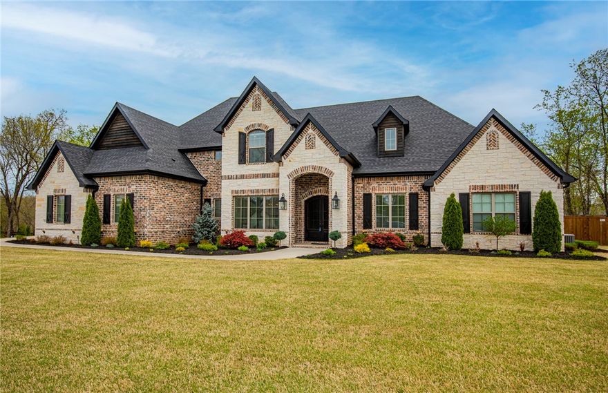 Stunning, like new, 5 bedroom home with a 1.02 acre lot in the Copper Ridge Estates subdivision! Bentonville Schools! This like new home has many upgrades including: Large kitchen island with open living space, butler and wine pantry, formal dining, formal office/study, large master bath and closet,  In-ground Gunite pool with fountain and integrated hot tub, custom fire pit and seating area, custom concrete by Ozark Pattern, Outdoor Grill, Outdoor wood burning fireplace with gas lighter, 5' cedar fence with steel posts, storage shed for lawn equipment, 3 car garage with epoxy flooring, additional 2 car garage extended for boat storage, wall mount cabinet system, Custom home theater with Dolby Atmos eleven speaker sound/ 120" screen/ projector, Wall LED movie poster frames, and 6 custom theatre chairs,  and professional landscaping and full irrigation system. Enjoy the upstairs bonus space and lodge feel with the stone fireplace. This home is an entertaining dream! Schedule your private showing today!