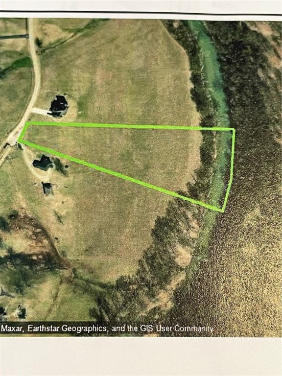 6.08 acres ready to build on. City water available on the front of the property. A meter will be needed. Electric at site. Prefect place to build a home at the front of the property. Walk down on your property to the Osage Creek. Priced to sell.