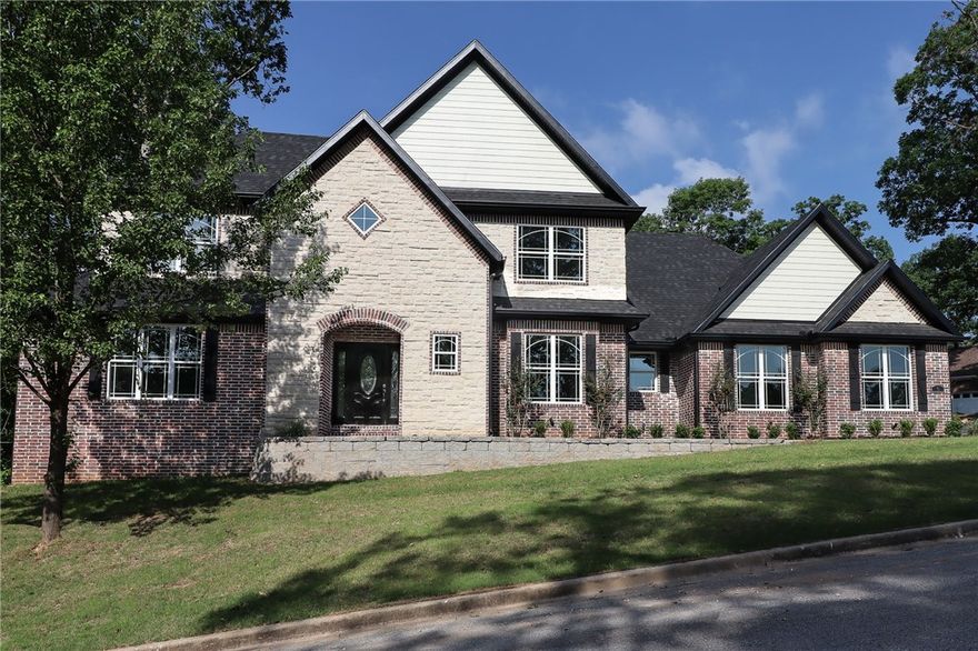 Beautiful executive home in Woods Creek Subdivision! 4 bedrooms with huge bonus room. Tank-less hot water heater, recirc pump, wired for smart home, beautiful master suite, and much more. Must see.