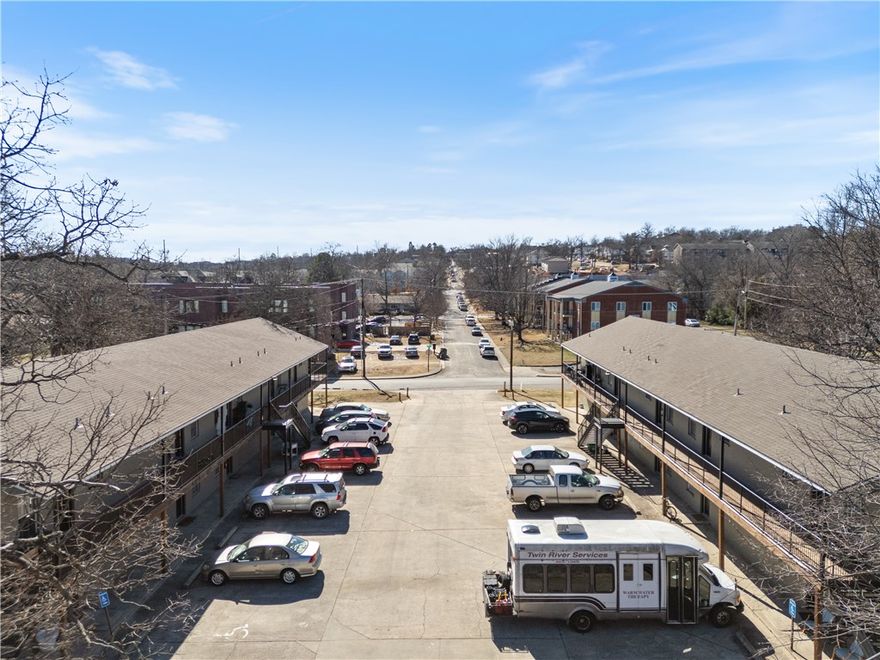 Arbor Vine is a 20-unit well-located multifamily property consisting of all two-bedroom units with significant capital improvements over the past five years including new roofs, siding, HVAC units, decks, and full interior renovations featuring LVP floors, granite counters, black appliances, and smart home thermostats. The property carries zero deferred maintenance and offers an ideal location for student and workforce housing, with close proximity to the University of Arkansas, major employers, and walkable retail and dining. Each unit is individually metered for water and electric and includes full-size washers, dryers, and dishwashers.
Despite its fully renovated condition, current rents trail comparable properties by $200–$300 per month, representing immediate upside for a new owner. Additional value-add opportunities include introducing pet rent, admin fees, and trash/pest billing — none of which are currently charged — as well as reducing the above-market landscaping cost of $439/month.