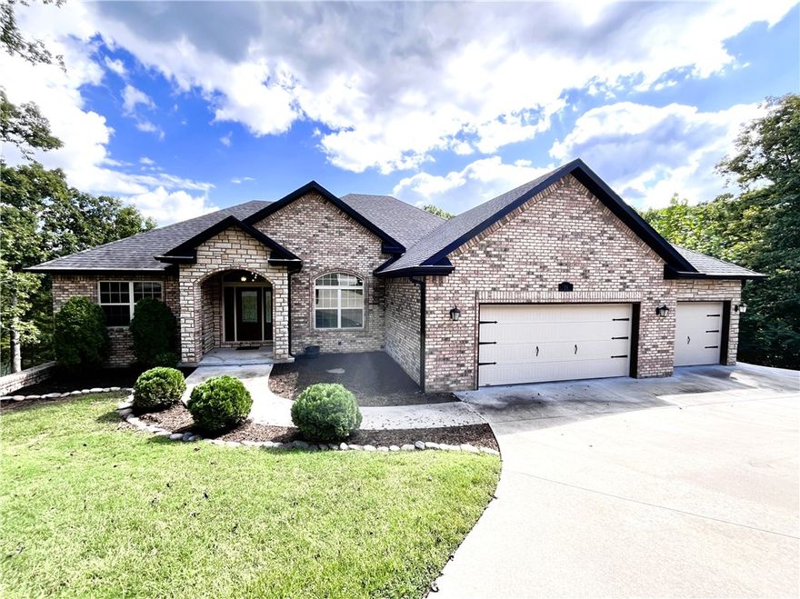 Escape to your own private retreat in the heart of Bella Vista! With 4 bedrooms, 3 full bathrooms, two living area. Over 3,000 sq ft of thoughtfully designed living space, this home offers the perfect blend of privacy, comfort.

Step inside and you’re greeted by open, airy living areas, a large kitchen with a layout that’s perfect for both daily living and entertaining. The peaceful wooded backyard with a lake view with no rear neighbors offers the ideal setting for morning coffee, sunset views, or weekend relaxation. This home checks all the boxes. Lawncare and Trash in included.
